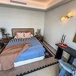 -Malagasunapts-Tower Living Sea Views Pool Gym Park