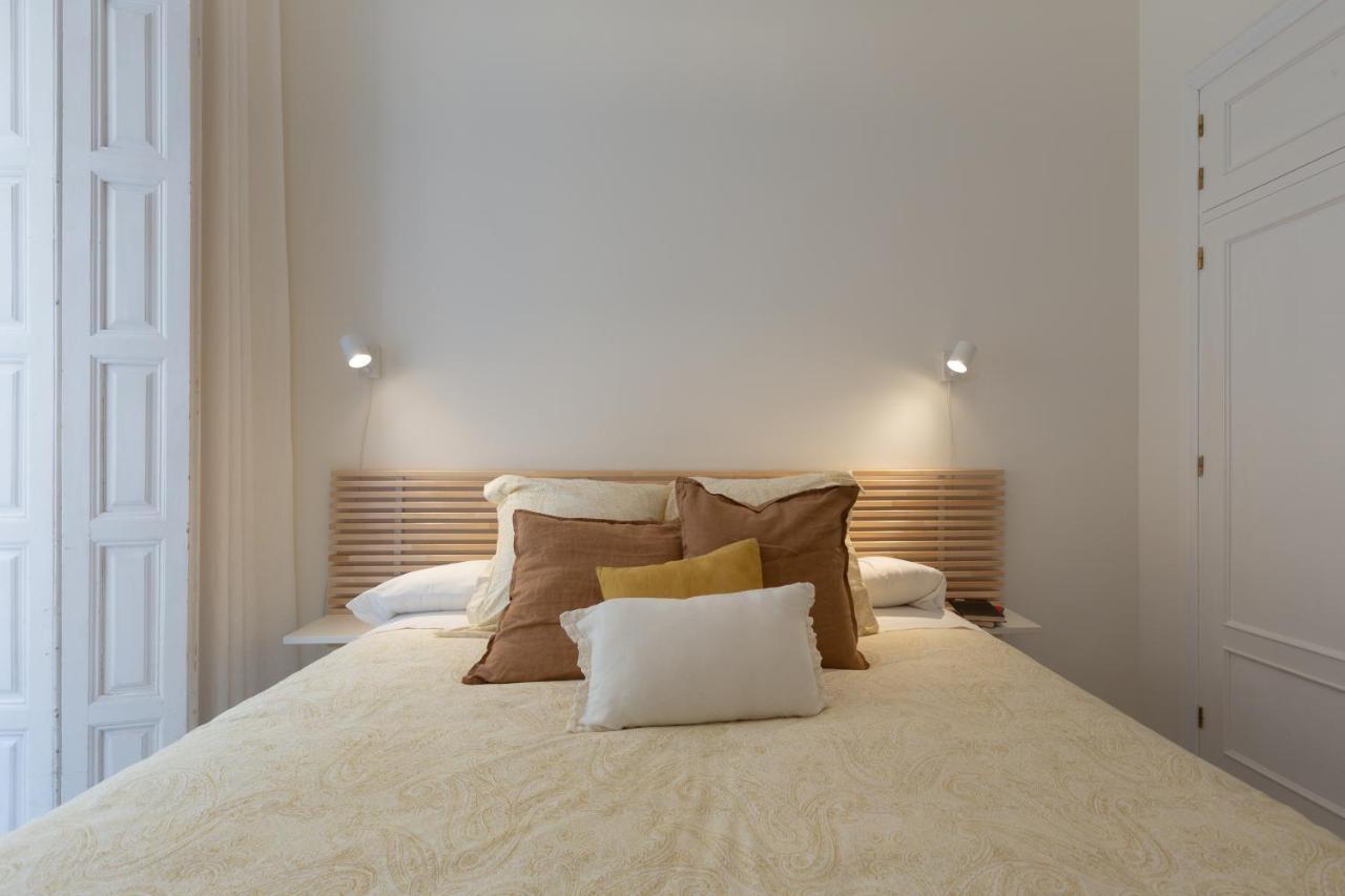 Apartment Puerta De Larios: Three-bedroom With Balconies And Patio